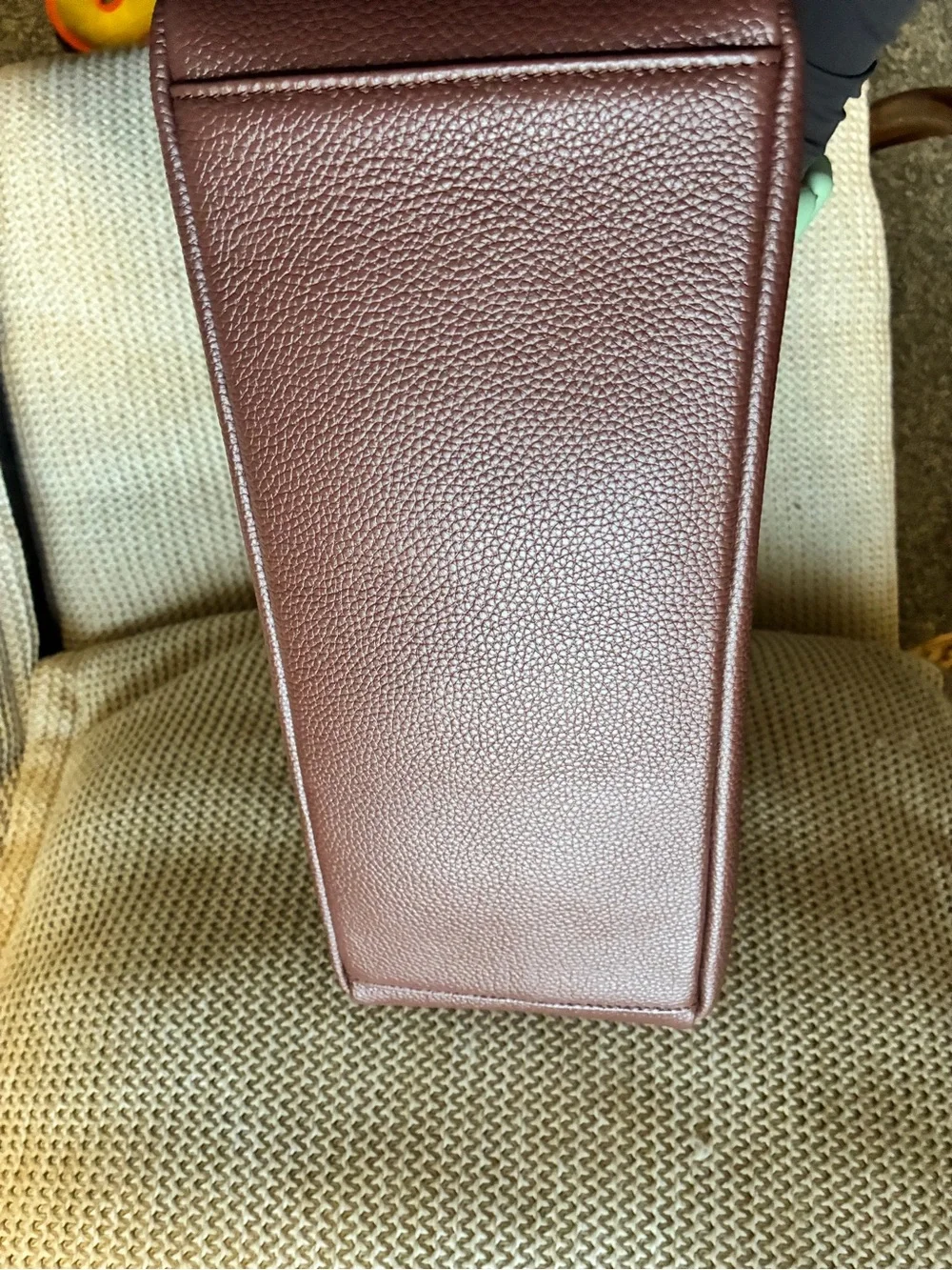 All on seven pebbled leather chocolate bag